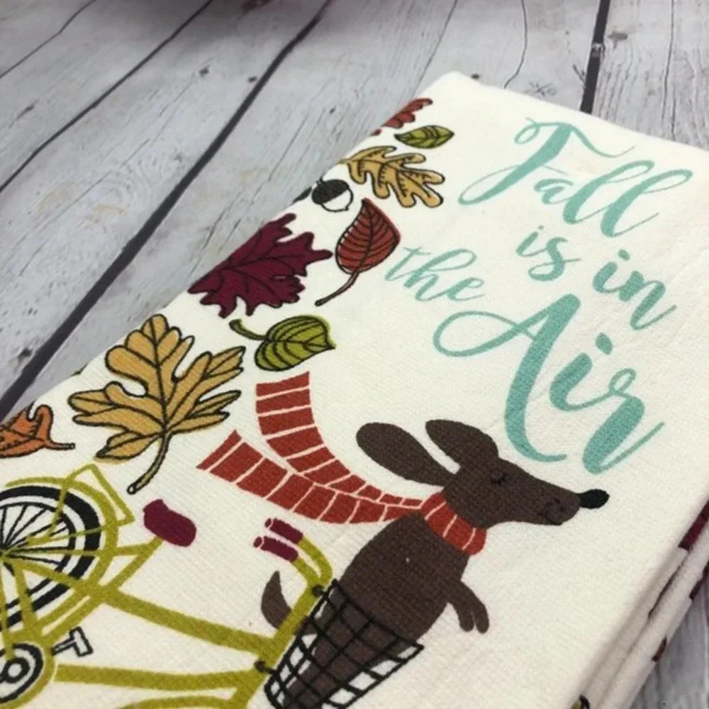 Dachshund riding bike in fall kitchen towel set of 2
